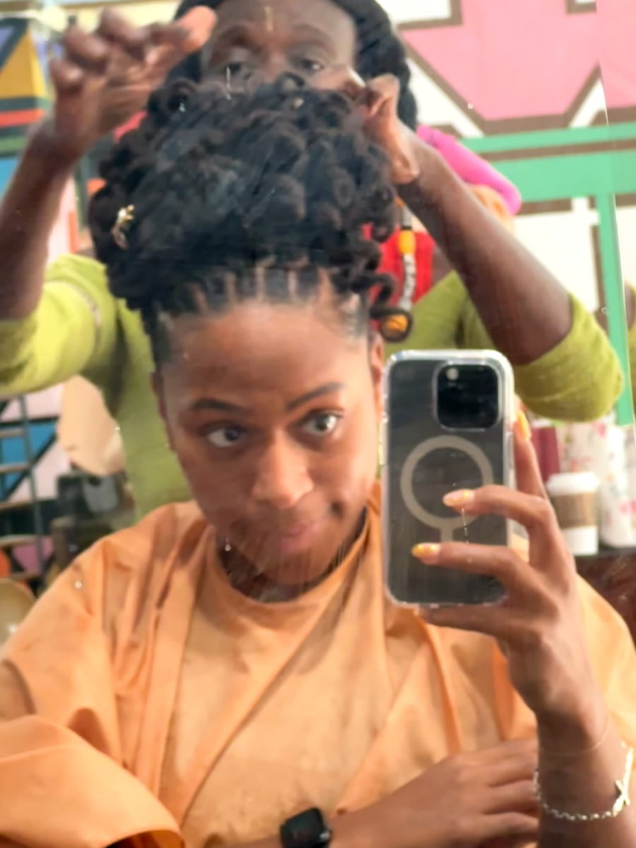Stephanie working on client loc updo in her Brooklyn salon — True Head No Lye loctician