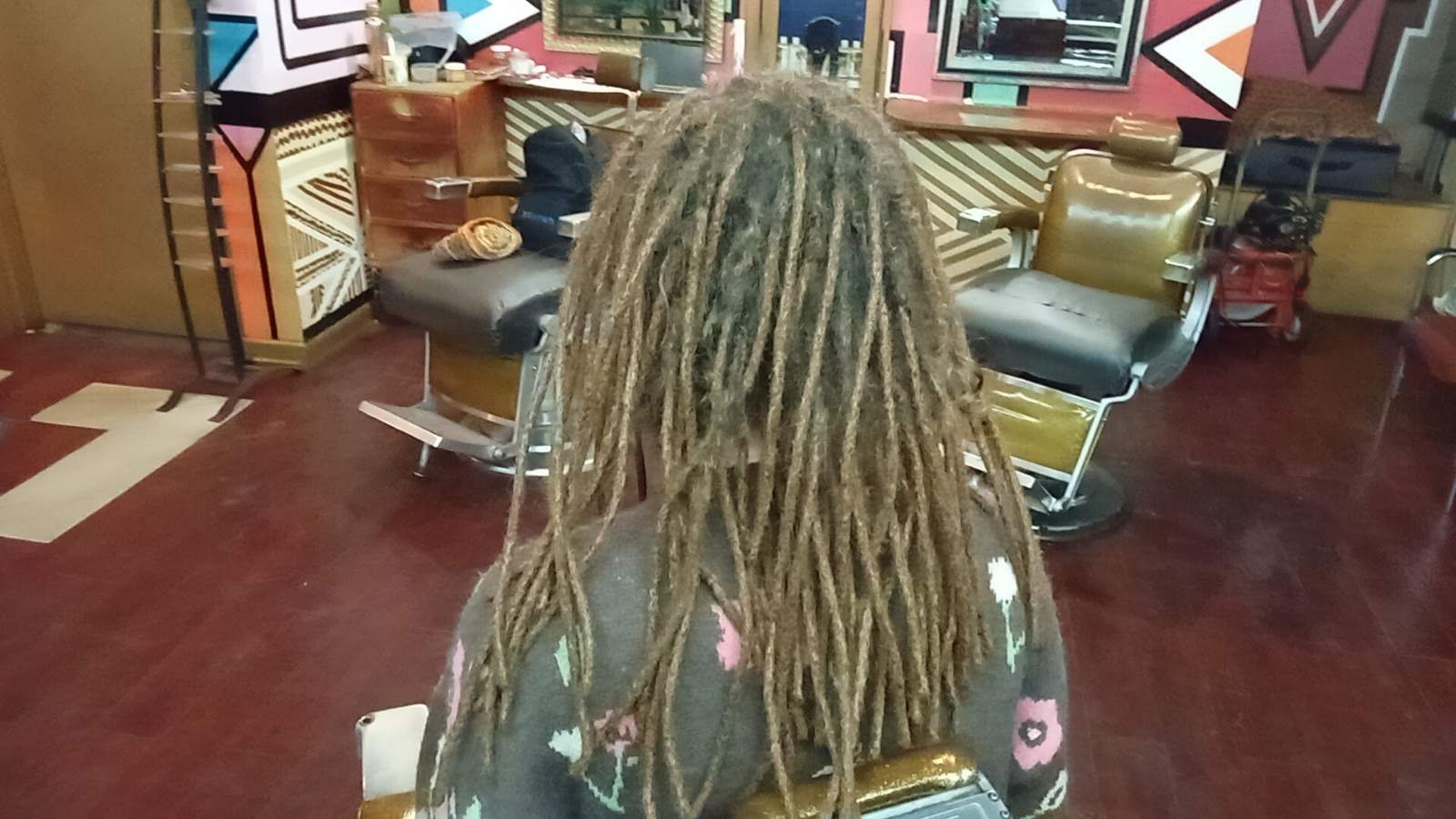 Loc repair and restoration service — expert loctician fixing damaged locs in Brooklyn salon